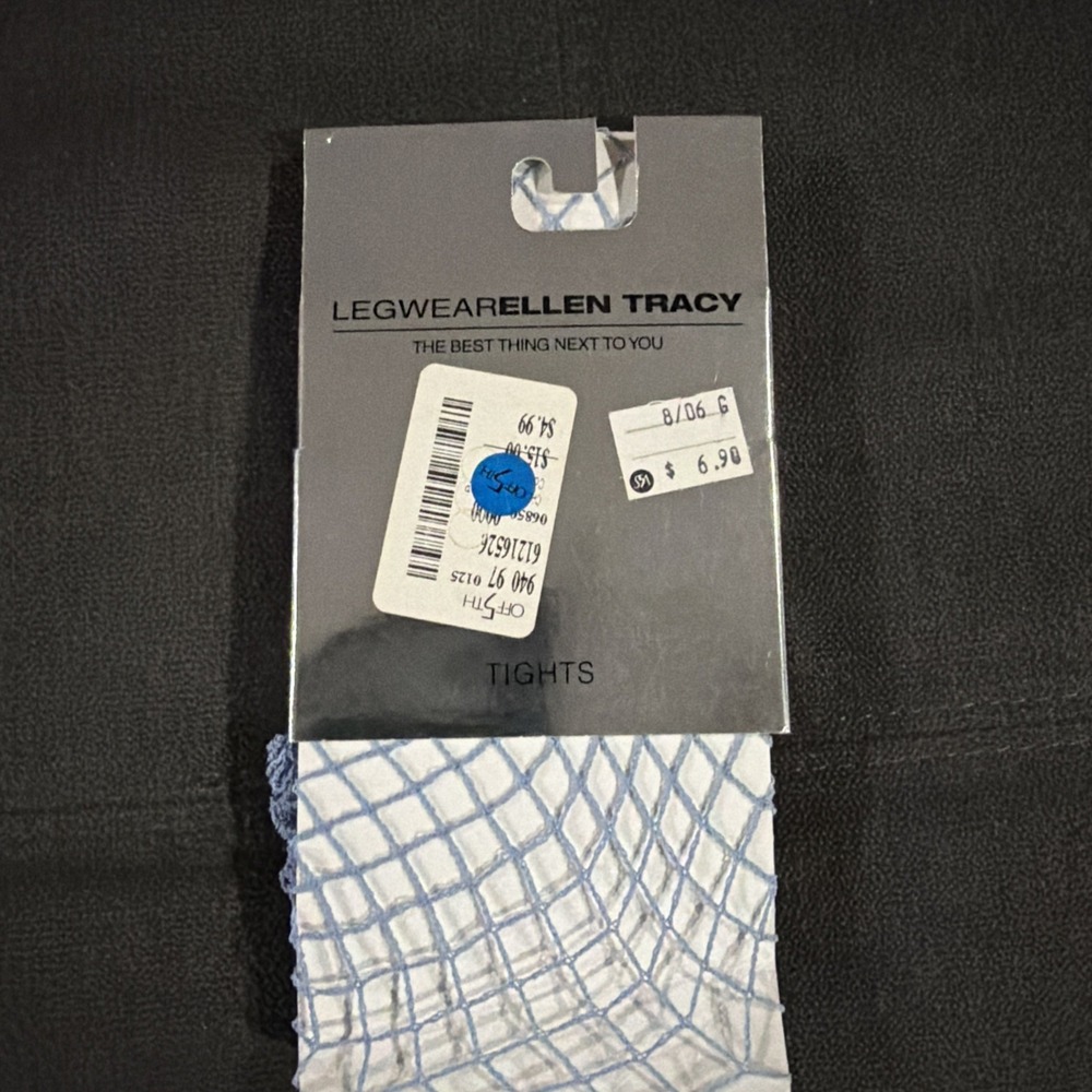 0040 New Ellen Tracy Legwear fishnet tights in a beautiful sky blue color.